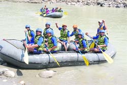 Army jawans get rafting training on the Saryu river.