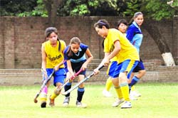 A match in progress at the Inter-Council School Junior Girls Hockey Tournament in Dehradun on Friday.