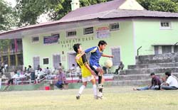 Players in action during a match at the RB Singh Memorial Football Tournament in Dehradun on Friday. 