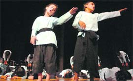 Schoolchildren give a performance at a two-day Childrens Theatre Festival in Jammu on Friday.