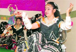 Students perform a folk dance at Green Land Convent School in Ludhiana. Tribune photo: Inderjeet Verma