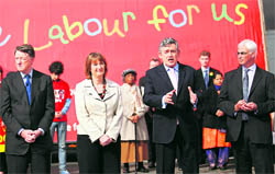 Britains Prime Minister Gordon Brown (2nd R) speaks during the unveiling of a new poster campaign of the Labour Party in Birmingham, central England, on Friday. 