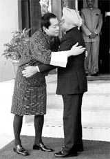 Prime Minister Manmohan Singh greets 4th King of Bhutan Jigme Singye Wangchuck at a  meeting in Thimphu on Friday. 