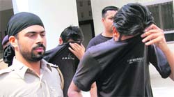 The accused being taken to a court in Chandigarh on Saturday. 