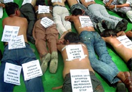 Activists from Surbhi Parivar, an NGO, hold a protest seeking implementation of the 'two-child norm Bill' as India started counting for the new census, in New Delhi on Saturday