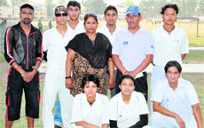 Neelam Bisht and Sneh Rana (sitting), selected for the national team along with five local boys selected for a freindly tournament to be played in Bangladesh.