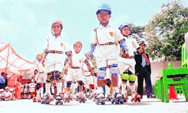 Children participating in a roller skating competition at Auckland School during its sports meet at Shimla on Saturday.
