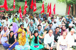 CITU members protest on Labour Day demanding implemention of labour laws and better working conditions, in Jammu 