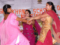 Students perform group dance during a farewell function. Photo: Raj Sadosh