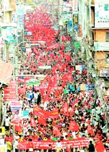 Thousands of Maoists and their supporters take part in a rally in Kathmandu on Saturday.