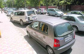 While the Chandigarh police is carrying out a drive against illegal parking all over the city, more than 100 cars were parked illegally in front of the Golf Club in Chandigarh last Monday, when its election results were announced