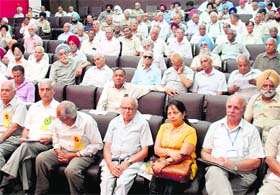 Members of the Defence Service Civilian Pensioners Welfare Association attend the silver jubilee function at museum auditorium in Sector10, Chandigarh