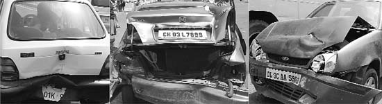 The three damaged cars that collided with each other at the Dera Bassi bus-stand traffic lights