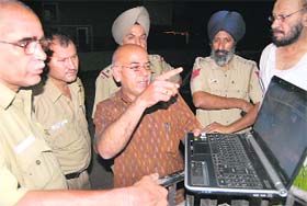 Nirmal Parkash shows footage of a man hurling a brick on his car at Sector 21 in Chandigarh