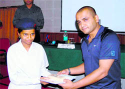 Dehradun SSP Abhinav Kumar honours a student in Dehradun on Sunday. 