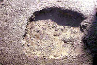 a pothole on the Landour Bazar road
