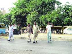 Pedestrians cross the NH 1 in a hurry at Doraha.