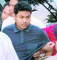 Ranjan Daimary, chairman of the anti-talk faction of National Democratic Front of Bodoland, being taken to a court in Guwahati on Sunday.