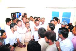 A heated exchange of words takes place between BJP councillors and MC Chairmans supporters in Haridwar on Saturday.