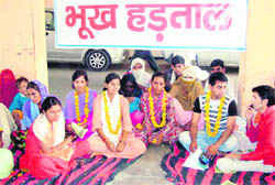 Dalit girls from violence-affected families of Mirchpur village on a hunger strike outside the Mini Secretariat in Hisar.
