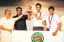 Students of KV No 1 with the award after winning the city finals of the Limca Book of Records Quiz, 2009, in Ambala Cantt.