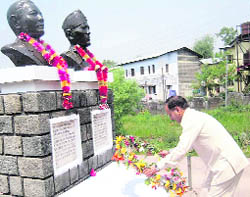 Industries Minister Kishan Kapoor paying tributes to martyr Capt Dal Bahadur on his 65th death anniversary at Dharamsala on Monday