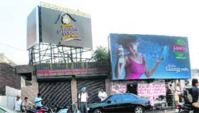 Unipoles atop private buildings continue to mushroom in Ludhiana in the absence of any check.