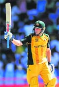 David Hussey acknowledges the crowd after completing his half century at The Beausejour Cricket Ground on Sunday. 