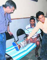 A patient with the Ilizarov apparatus at the PGI.