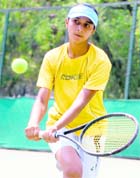 Nikita plays a shot during the U-16 AITA Tennis Tournament at the Chandigarh Lawn Tennis Association courts on Tuesday.