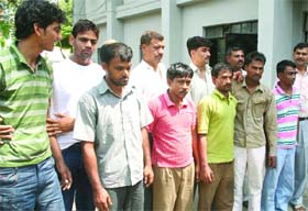 The gang members in police custody