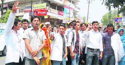 Students of Narayan Swami Dental College stage a protest in Dehradun
