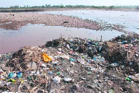 Garbage dumped into the Tawi poses a threat to its existence in Jammu