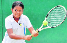 Nandani in action at the 16 AITA Tennis Tournament quarterfinal match in Chandigarh on Wednesday. 