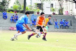 Players in action during a match at the S Kandhari Memorial Hockey Tourney in Dehradun on Wednesday.
