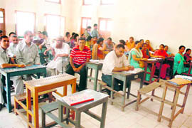 Not Very Attentive: Enumerators and supervisors at a census training workshop in a school in Jammu on Wednesday. 
