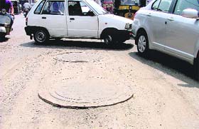 The raised manholes are a traffic hazard in Ludhiana