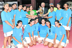 The Welham Girls basketball team with the All-India Golden Jubilee Inter-school Basketball trophy in Dehradun