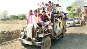 An overloaded maxi cab in a Mewat village, speaks volumes of the state of public transport and traffic regulation in the area.