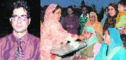 Dr Shah Faisal, who topped the Civil Services Exams-2009, conducted by the UPSC, the results of which were declared on Thursday; and (right) Faisals family members and relatives celebrate his achievement