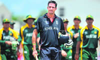 Englands Kevin Pietersen walks ahead of Pakistani cricketers after their match at the Kensington Oval in Bridgetown on Thursday. England won the match by 6 wickets.