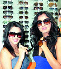 Models display a new range of sunglasses of Himalaya Opticals at a store in Amritsar