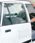The Maruti car with Bom Blast 1 pm, scribbled on its side, at the Sector 3 police station in Chandigarh.