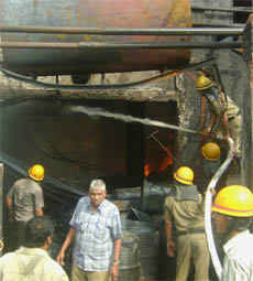 Firefighters try to douse a fire that engulfed a chemical unit near Daulatabad village in Gurgaon on Friday.
