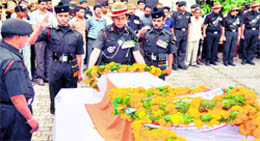 Major Yogendra Singh Rajbar's last rites being performed at Khadkhadi cremation ground in Haridwar