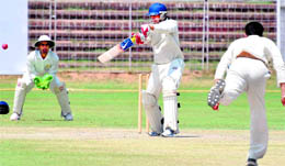 A batsman plays a shot at the cricket stadium in Sector 16, Chandigarh, on Saturday. 