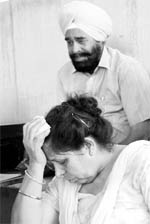 Grieving family members of the victim