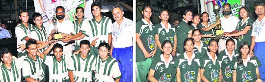 The winning team of the Indoor Cricket Tournament receive the trophy in Dehradun on Saturday and (right) the womens winning team get the trophy.