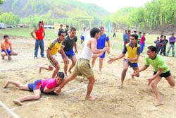 A kabbadi match in progress during the Krida Bharti rural games at Opundha village near Dehradun on Saturday. 