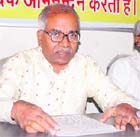 Ramesh Patange (left), RSS ideologue, addresses a press conference in Dehradun on Saturday.